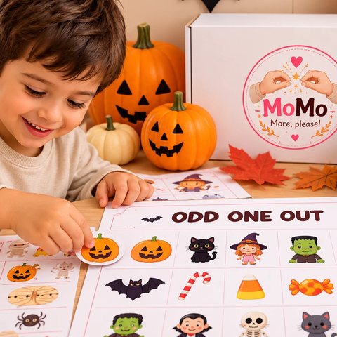 A boy working on the Odd One Out worksheet